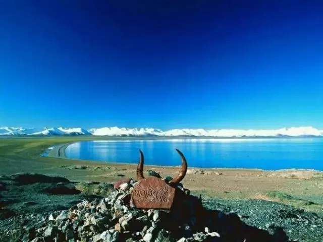 й